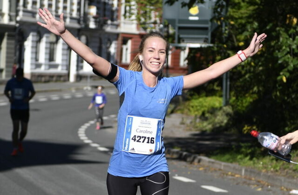 Smilende på vei ned fra St.Hanshaugen i åretsa Oslo Maraton. Foto: Bjørn Johannessen Kondis/Bjørn Johannessen