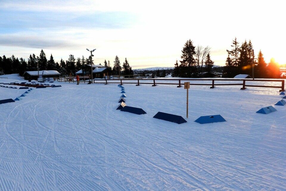 Kartbytte og mål på Sjusjøen langrennsarena. (Foto: Stein Arne Negård)