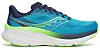 Blå og grønn Saucony løpesko med tykk hvit mellomsåle sett fra siden.