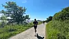 Langs strandpromenaden mot mål har Sondre Fylling fått noen meter og sekunder til konkurrenten som han holdt følge med hele veien.