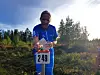 Anne Karin Westby målstempler i kveldssola.