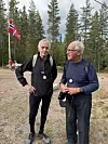 «Grensetrimmens far», Hans Odde (til v.) sammen med superveteran Jan Hagnæss gjennomførte begge 9,4  km i trimklasen da flagget på halv stang satte et spesielt preg på årets utgave som var den 42. i rekken.