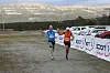 Ingulf Nordal (til venstre) og Bengt Michelsen i vennskapelig forbrødring mot mål etter 21 km.