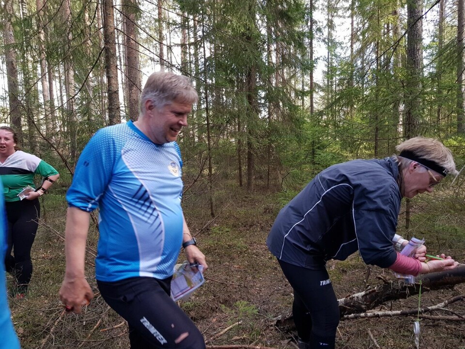 Trivelig bedrift o-løp i Moskogen i Moelv Ute i skogen på en av postene.jpg