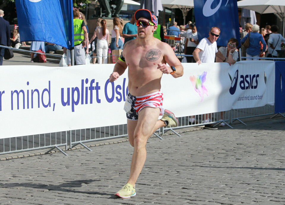 2314 løp den 40. utgaven av Sentrumsløpets 10 km lørdag 10km_mot_maal_en_varm_dag_Gaute_floer_Johnsen_AZ3T4357.jpg