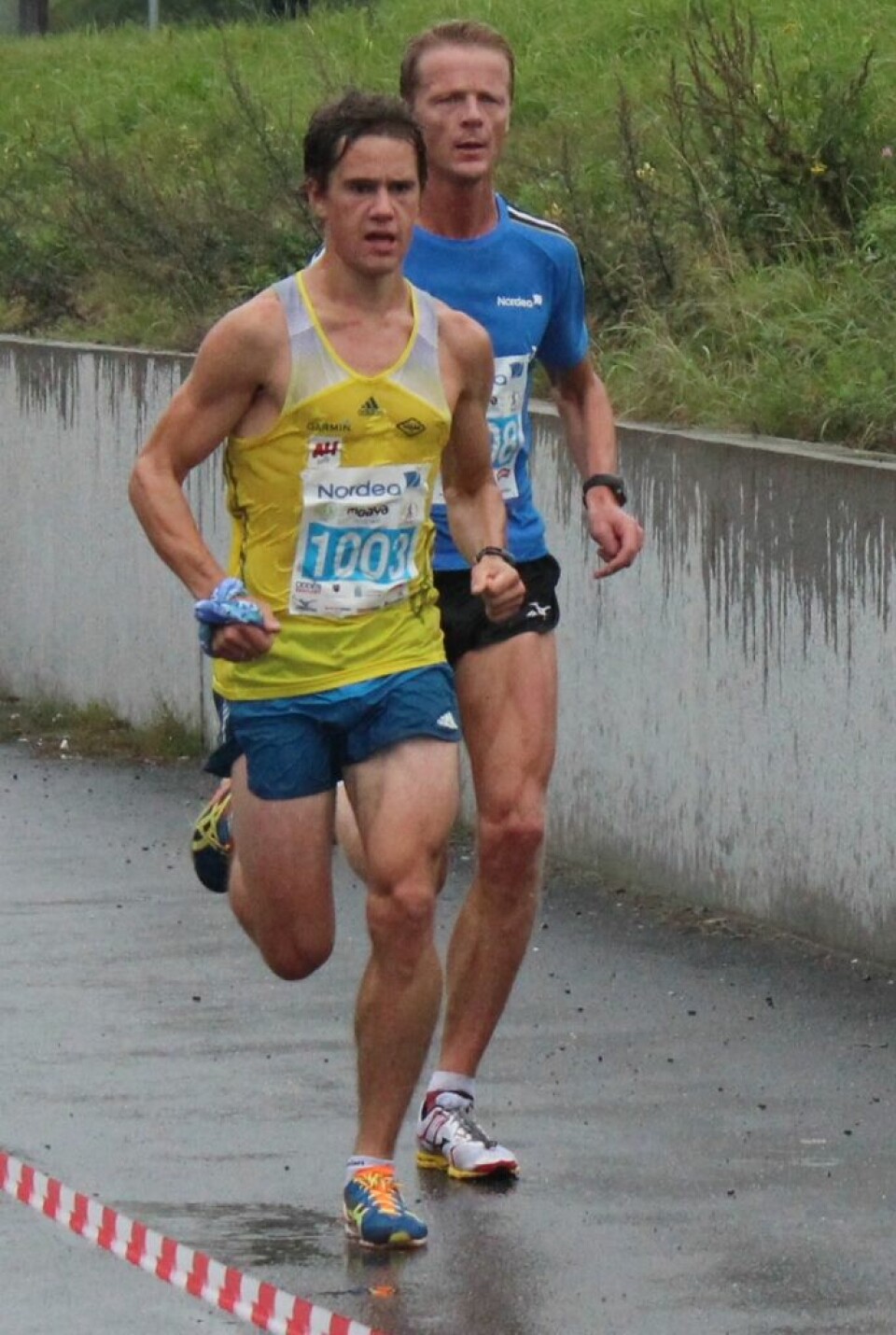Våt, men strålende debut for Grimstad maraton Eirik Gramstad & Ole Kr Heggheim mellemtid 1.jpg