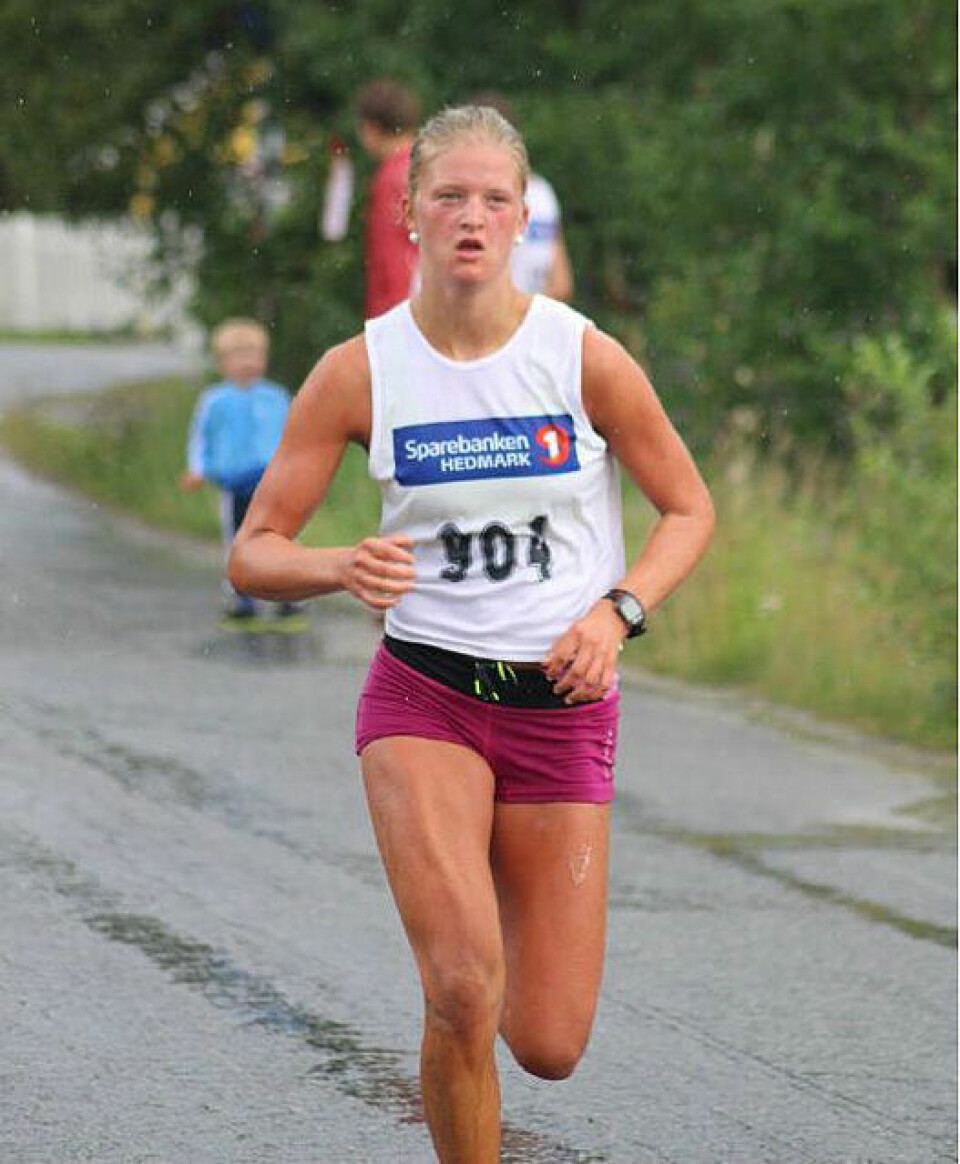 God deltakelse og avkjølende regn i Malmvegen Minneløp Marit_Oestvang_spurt.jpg