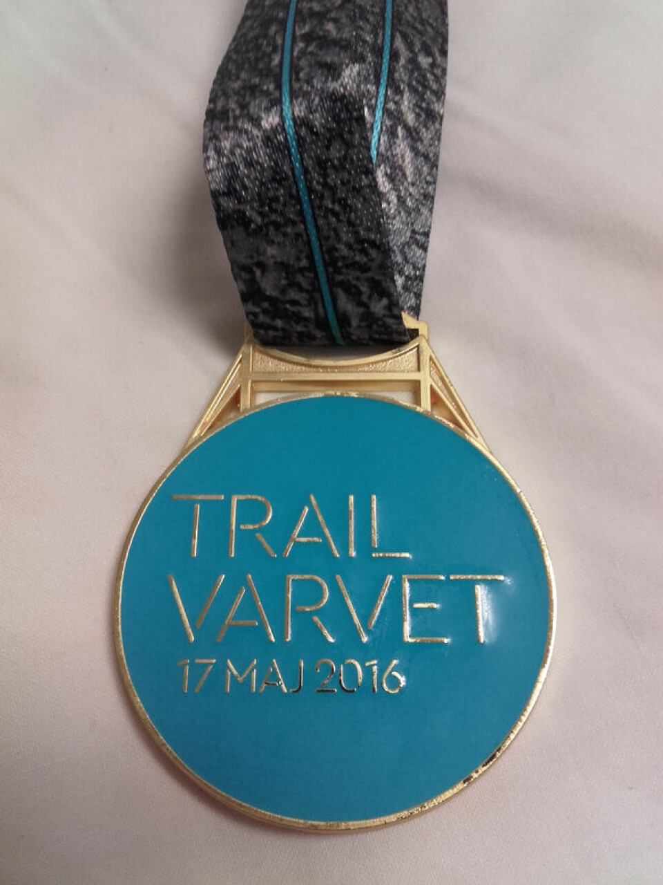 Lite sti, men god stemning i tidenes første TrailVarv Medaljens_framside.jpg