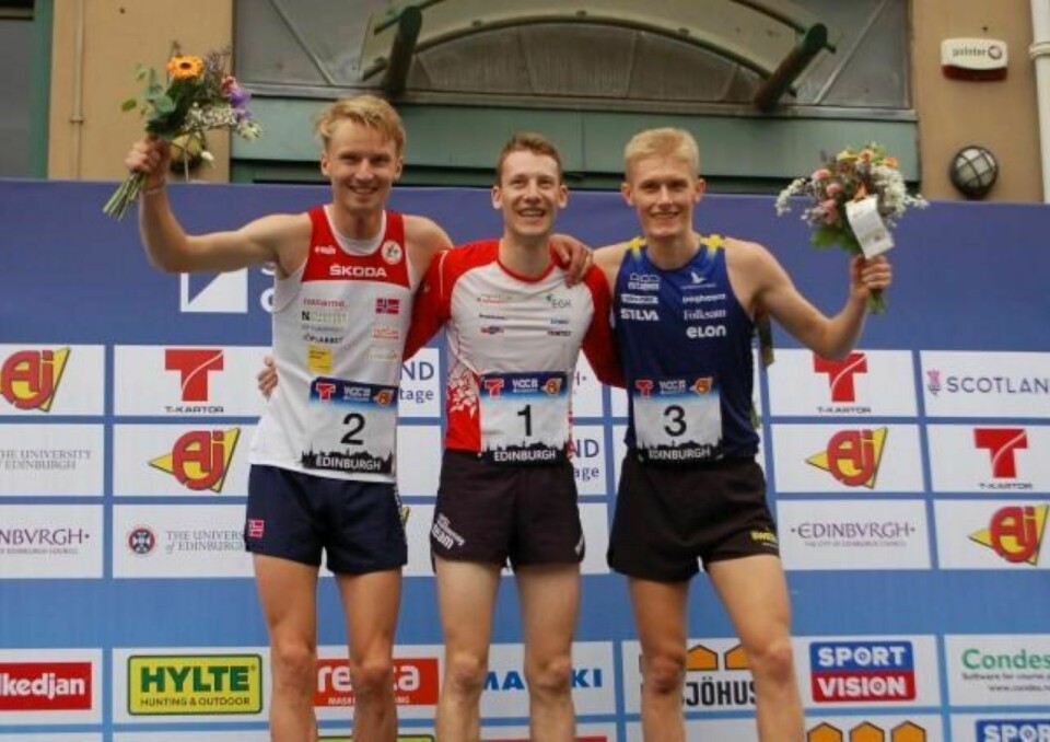 Jørgen Baklid (til venstre) på pallen sammen med vineren Riccardo Rancan og Jonatan Gustafsson. (Foto: Norsk Orientering) Jørgen Baklid (til venstre) på pallen sammen med vineren Riccardo Rancan og Jonatan Gustafsson. (Foto: Norsk Orientering)