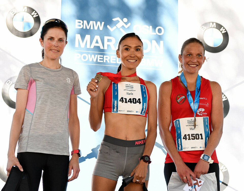 Thomas Asgautsen og Marfa Troeva vant Oslo Maraton Kvinnepallen_50D5054.jpg