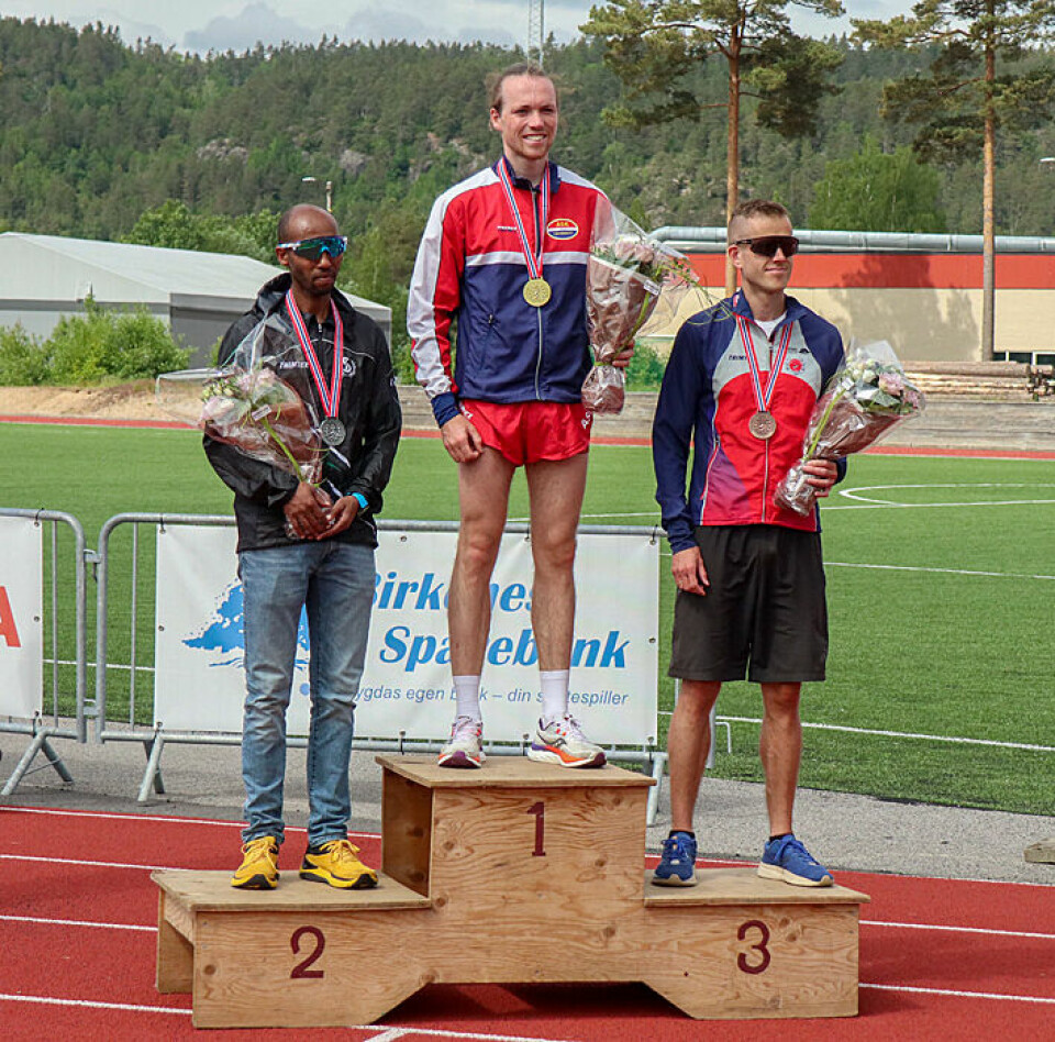 Sigrun Gjølberg og Marius Garmann Sørli tok NM-titlene på halvmaraton Pallen Menn.jpg
