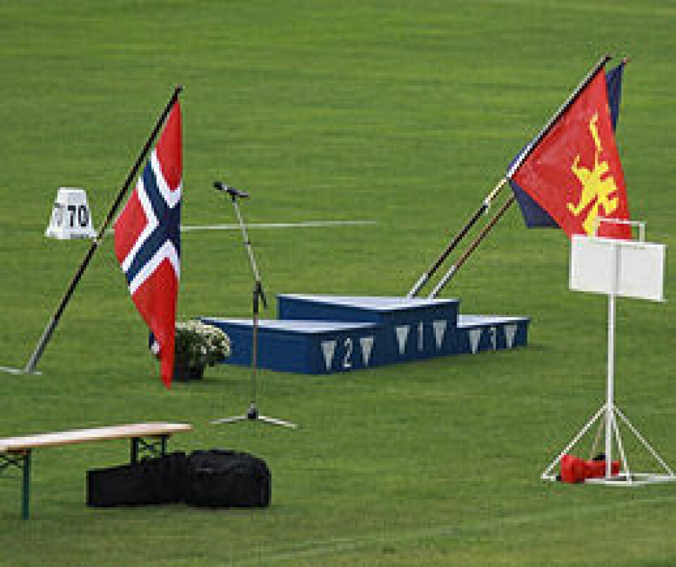 UM i friidrett i mål UM_flaggene