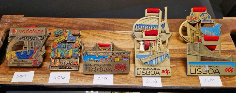 Johnny snudde en usunn livsstil og ble en aktiv løper Lisboa_medaljer.jpg