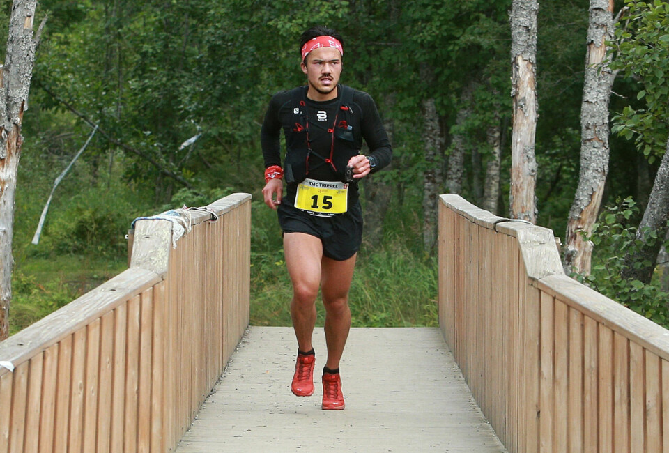Fra tredjeplass i Ekstremløpet fredag til klar seier i 50 km fjellultra lørdag for Elias René Valøy som er på vei over broa over Tromsdalselva og inn til mål på Tromsø Camping. (Foto: Kjell Vigestad) Fra tredjeplass i Ekstremløpet fredag til klar seier i 50 km fjellultra lørdag for Elias René Valøy som er på vei over broa over Tromsdalselva og inn til mål på Tromsø Camping. (Foto: Kjell Vigestad)