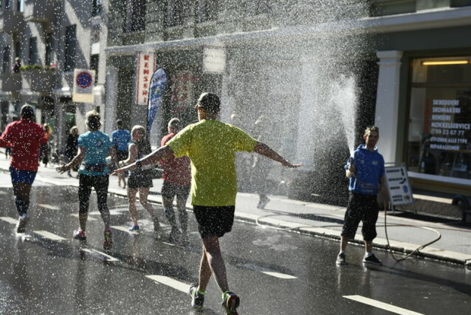 Den smilende løpsfesten Oslo Maraton hageslange vann