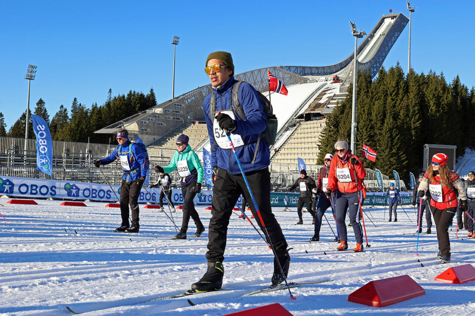Marit Bjørgen og Henrik Haugland Syverinsen vant Holmenkollmarsjen E29A2724.JPG