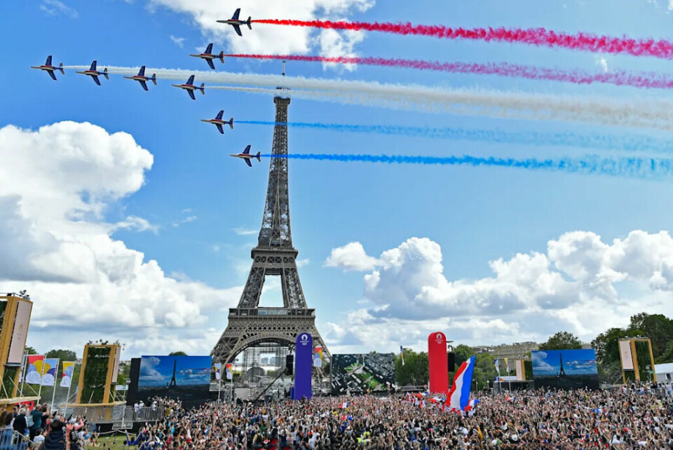 I sommer blir det olympiske sommerleker i Paris. Rødt, hvitt og blått er både franske og norske flaggfarger. (Foto: Olympics.com/Getty Images) Paris-Eiffeltårnet