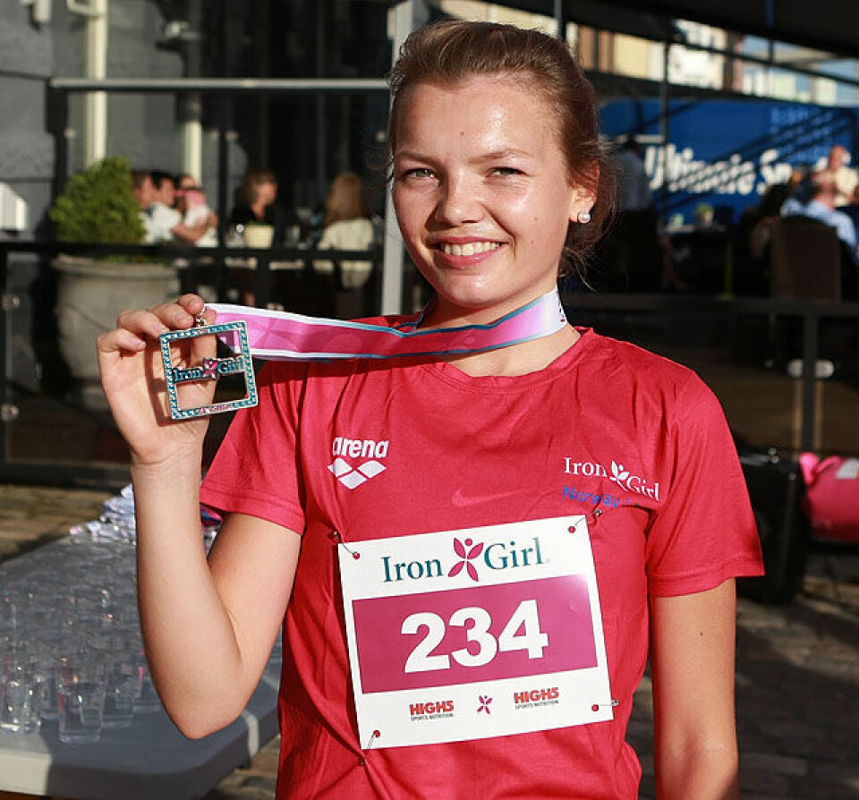 265 Irongirls farget Indre kai i Haugesund rødrosa Regine_Dalva_Lie_vinner_med_medlaje_AZ3T2919.jpg