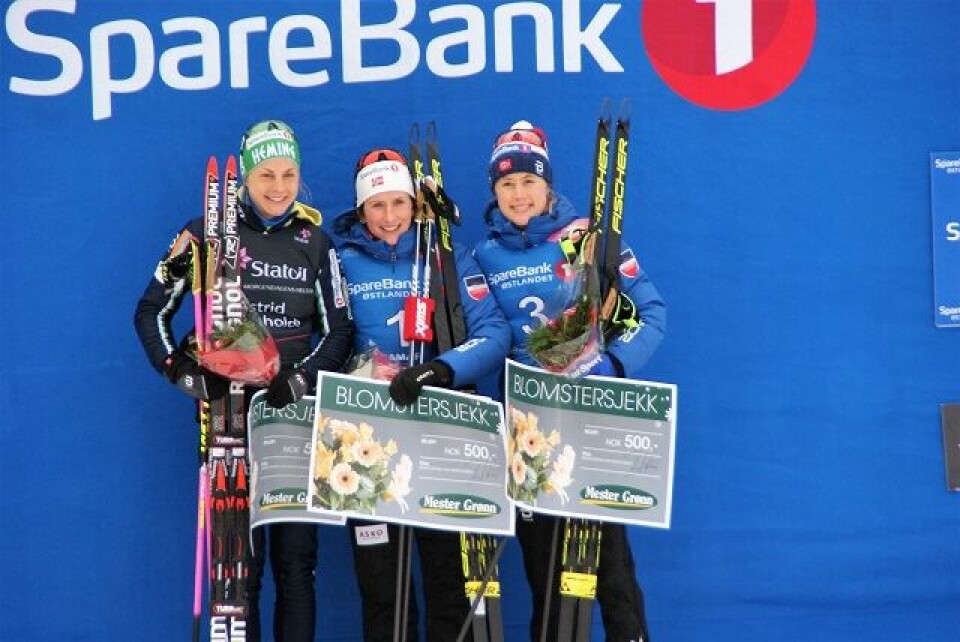 Marit Bjørgen og Martin Johnsrud Sundby vant skiathlon på Gåsbu Seierspall_kvinner.jpg