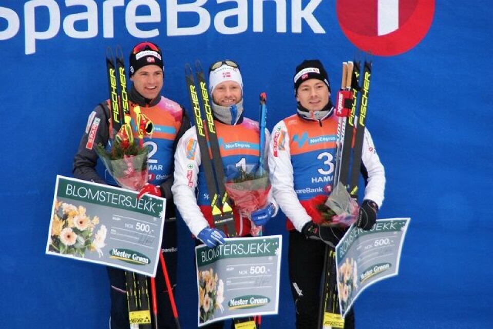 Marit Bjørgen og Martin Johnsrud Sundby vant skiathlon på Gåsbu Seierspall_menn.jpg