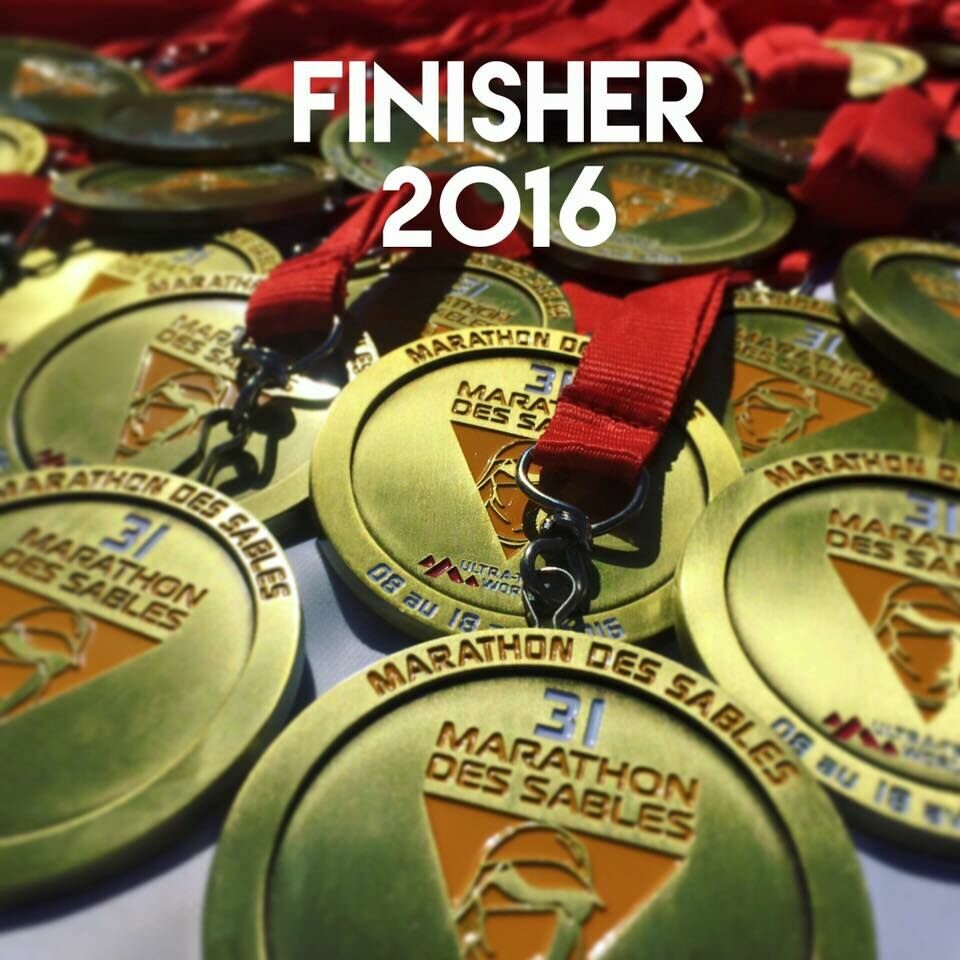Sondre Amdahl på 9. plass i Marathon des Sables Medaljer.jpg